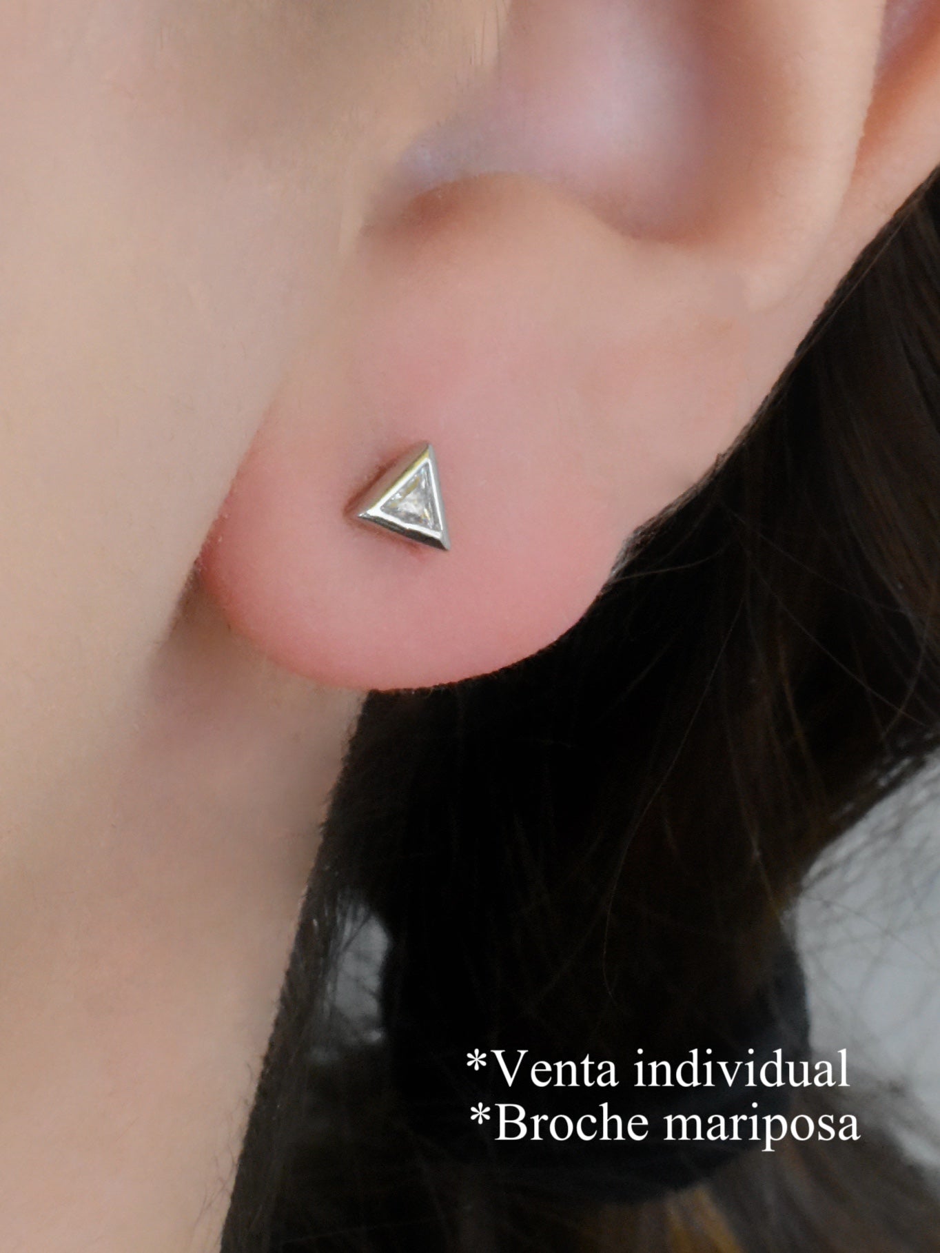Arete piercing triángulo