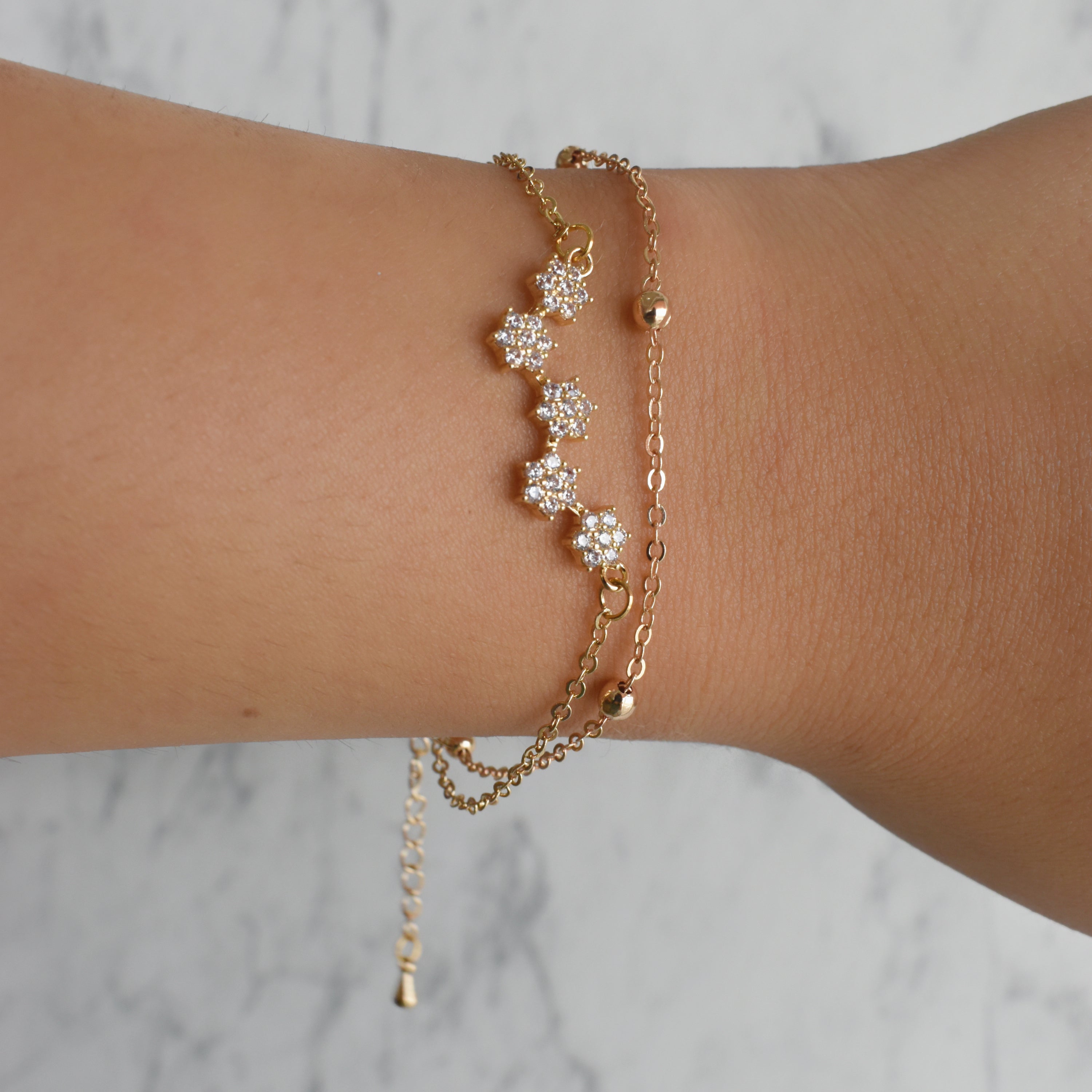 Pulsera doble flores (dorada o plateada)