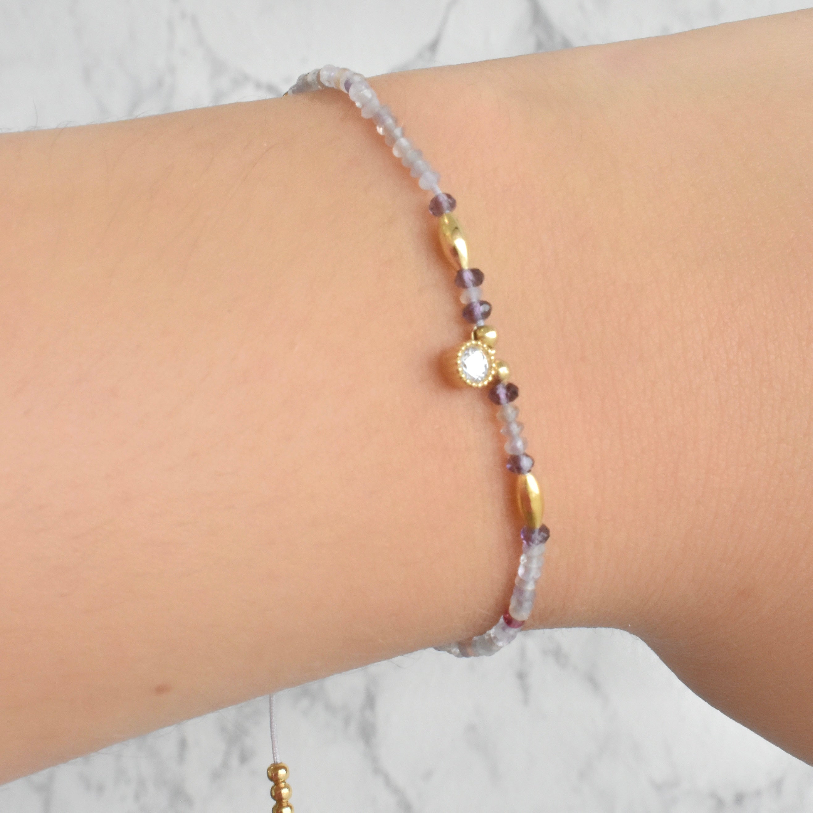 Pulsera mini bolitas circonia (café, colores, morado, rosa)