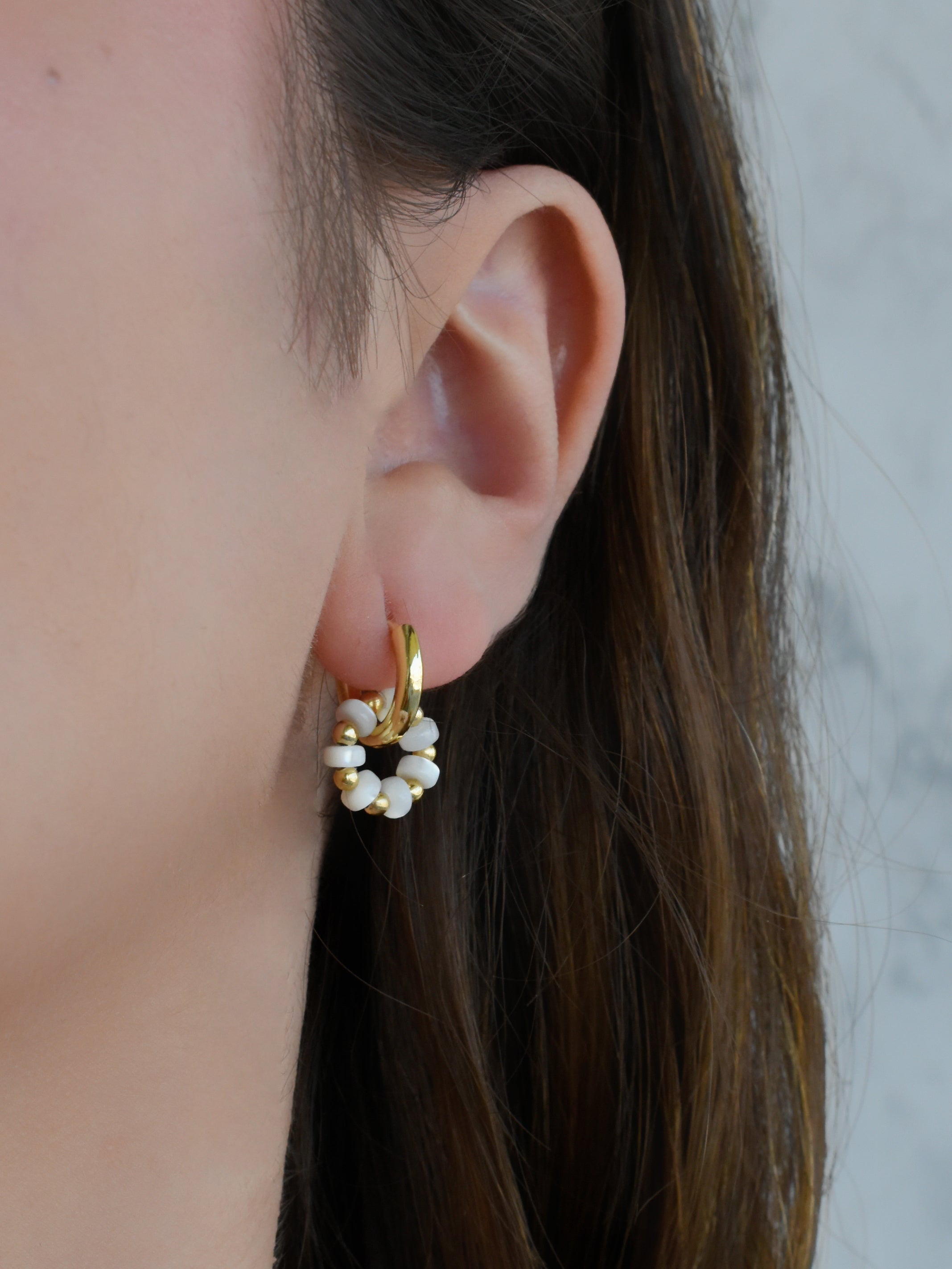 Aretes mini rueda perlitas