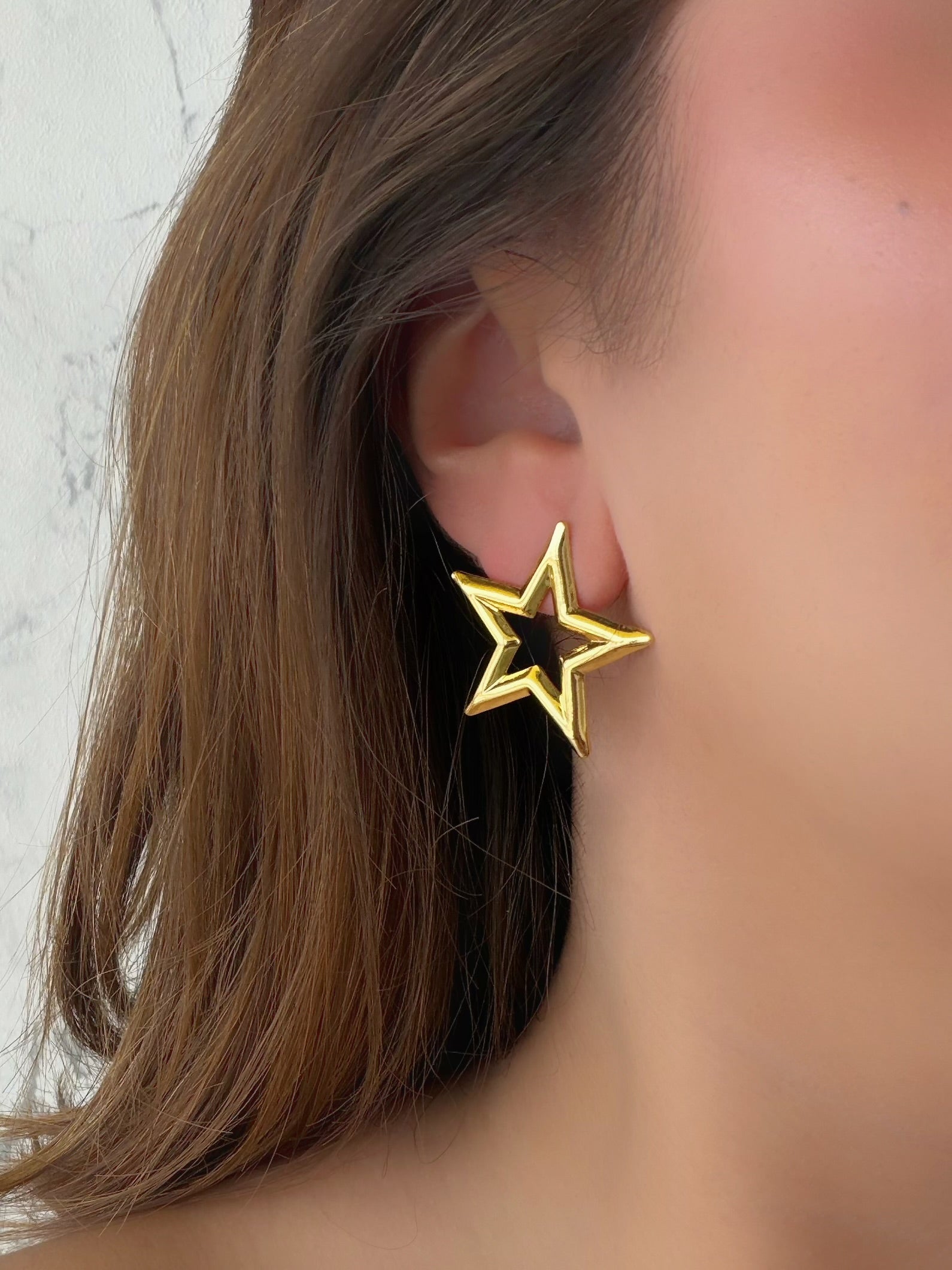 Aretes estrella lisa