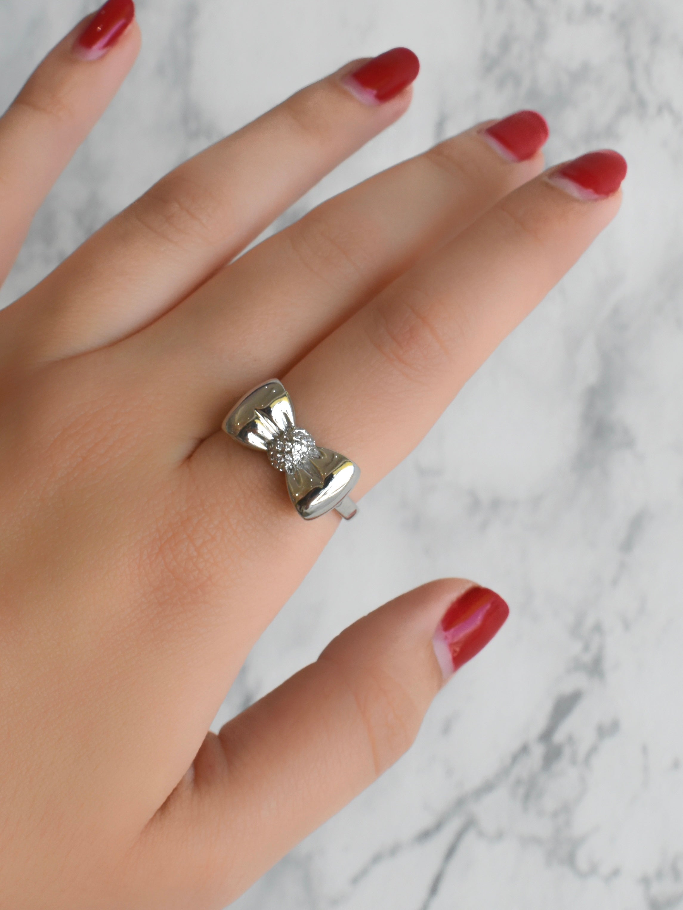 Anillo moño circonias (dorado o plateado)
