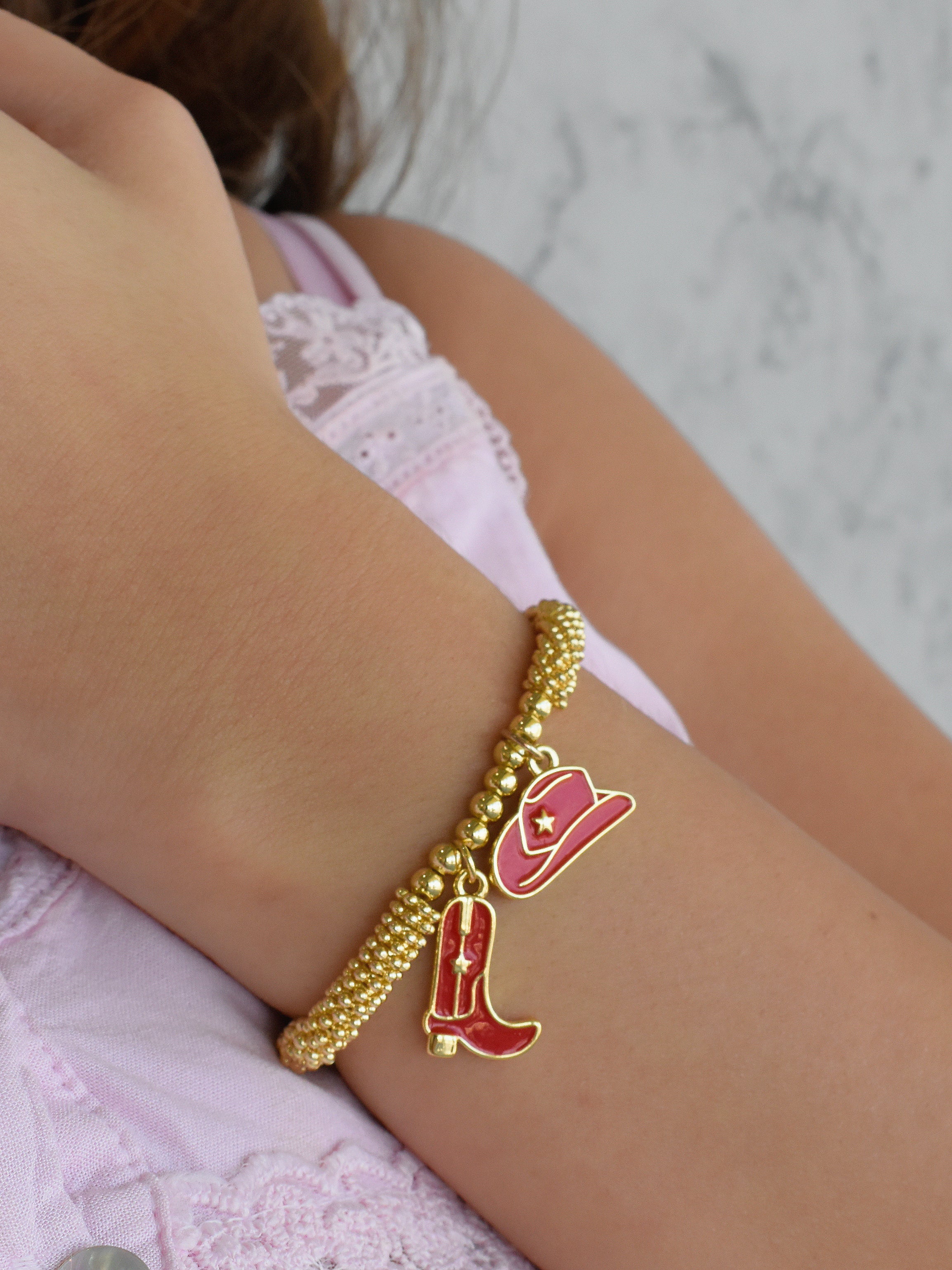 Pulsera charms vaqueros (rojo o negro)