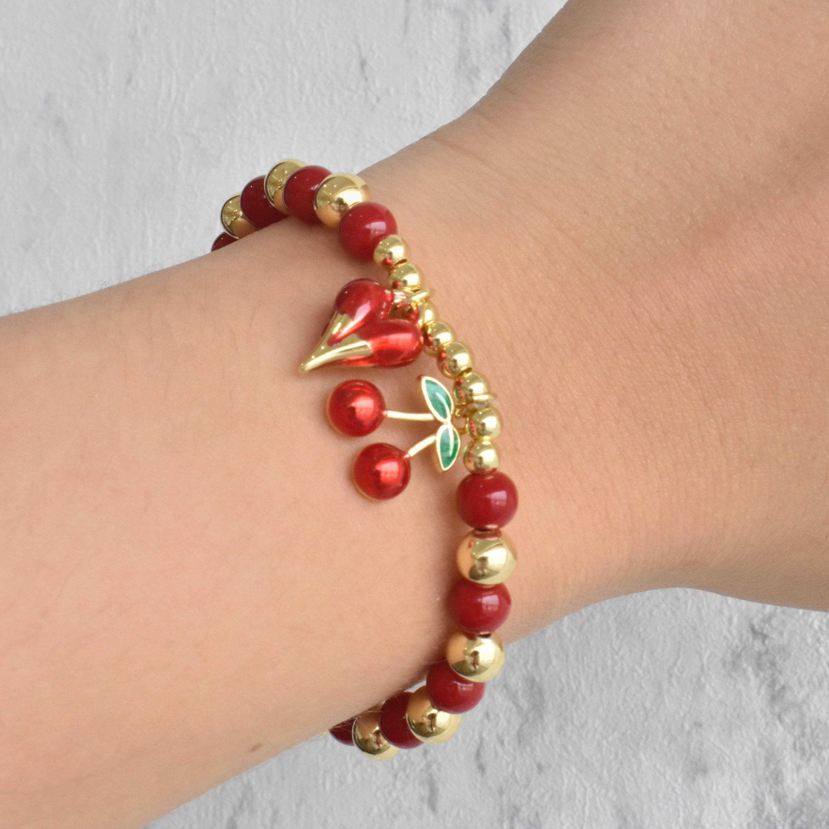 Pulsera roja cereza