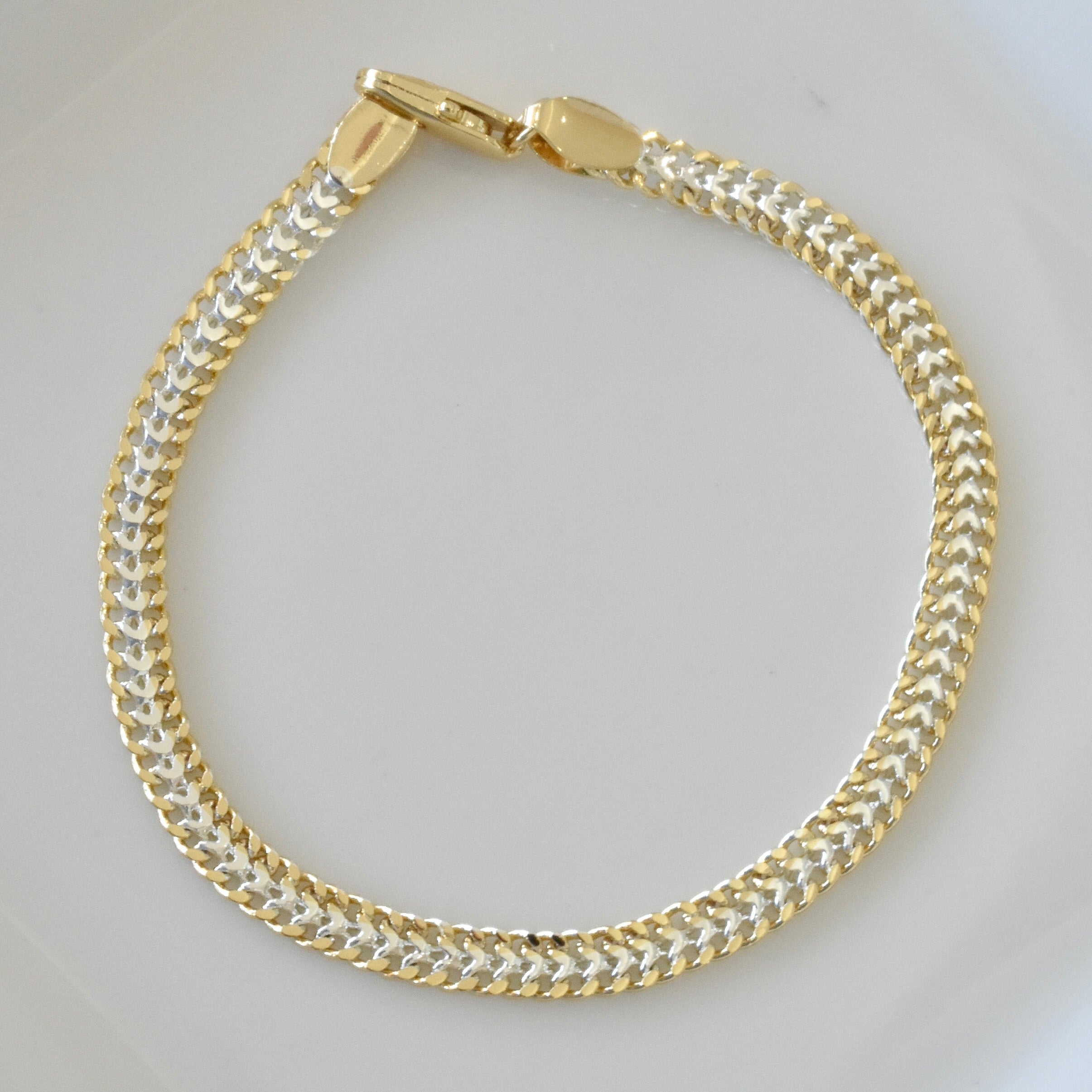 Pulsera tejido bicolor