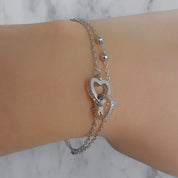 Pulsera doble corazones (dorado o plateado)