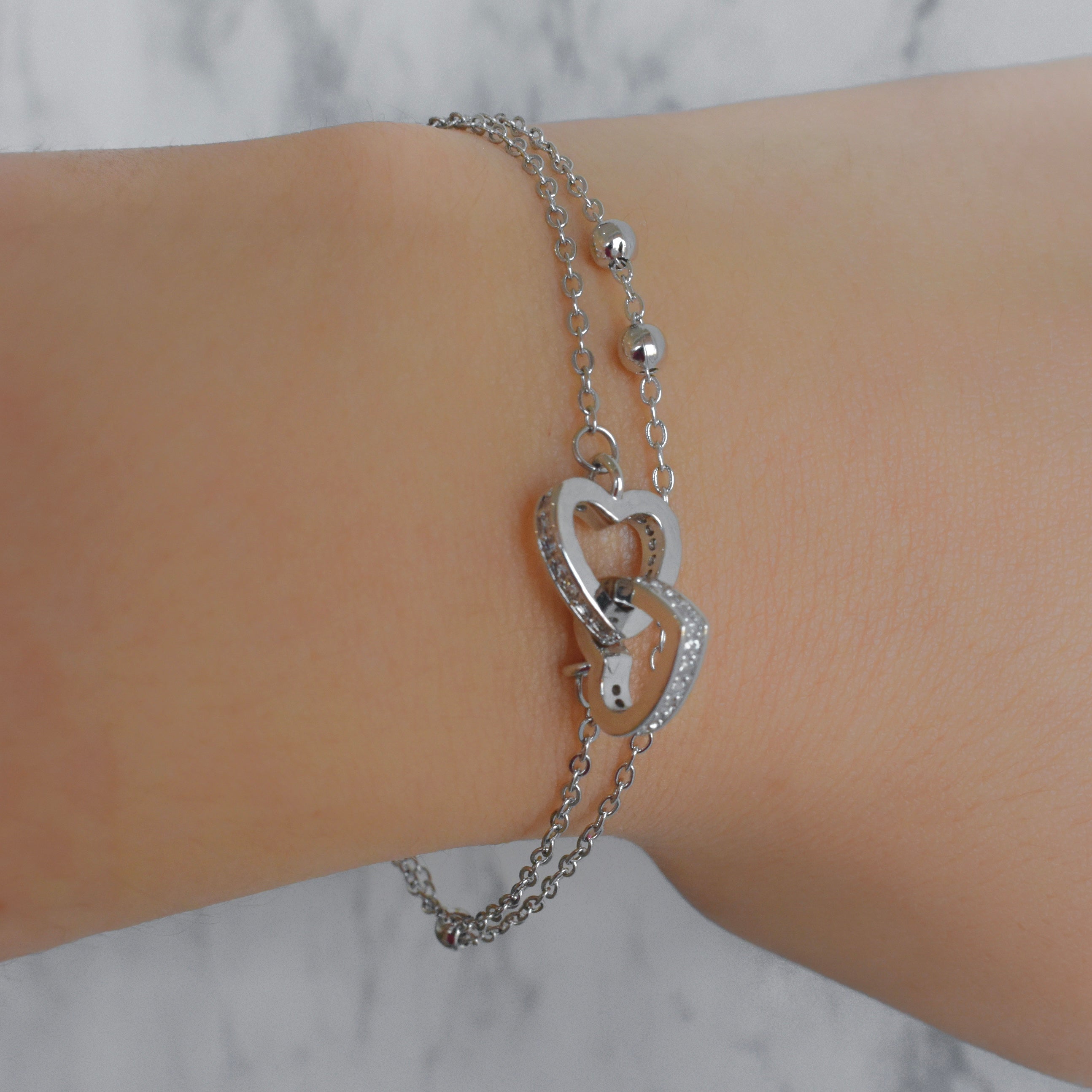 Pulsera doble corazones (dorado o plateado)