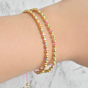 Pulsera bolitas colores (rosa pastel y rosa fucsia)