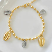 Pulsera conchitas de mar (bicolor y dorada)
