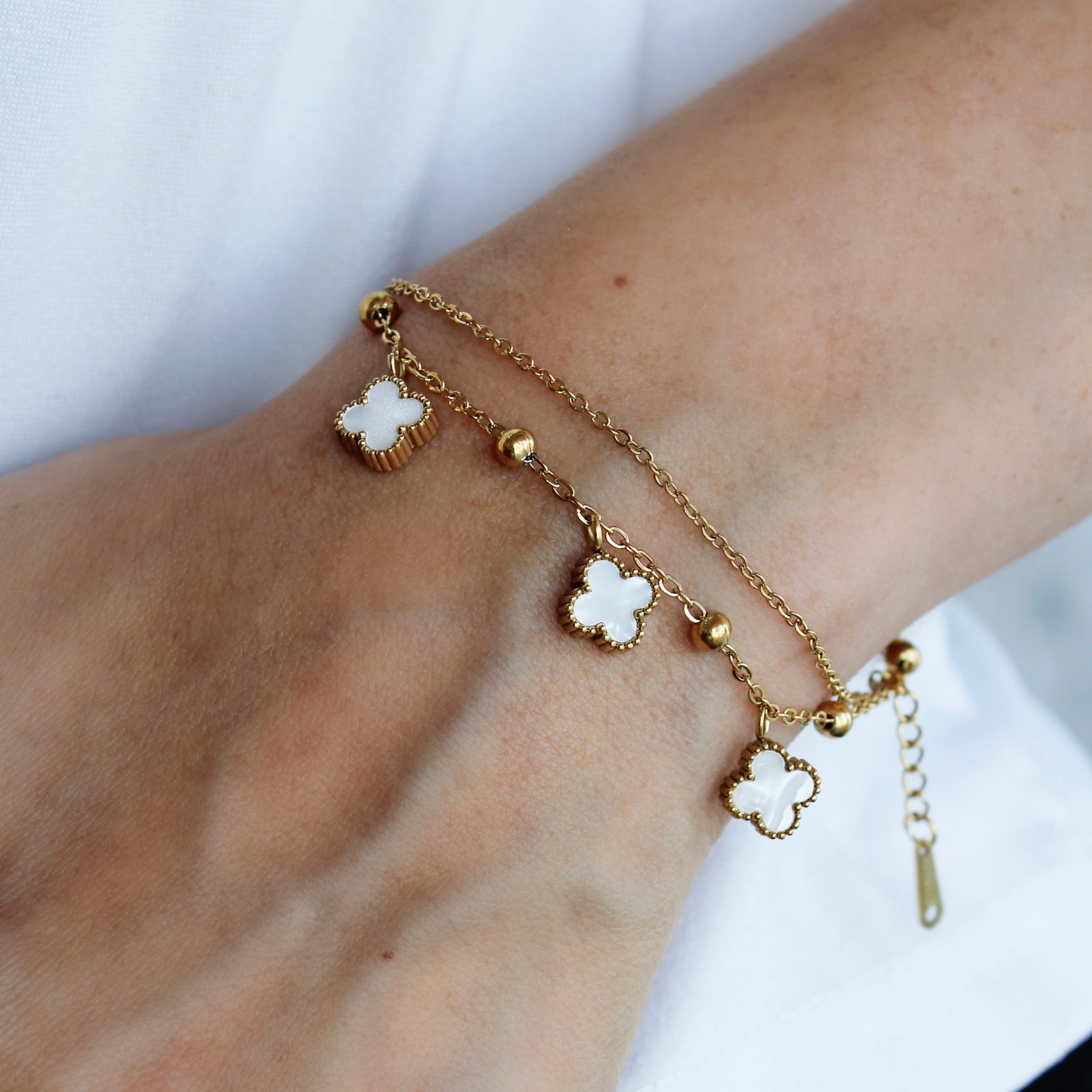 Pulsera doble trébol blanco