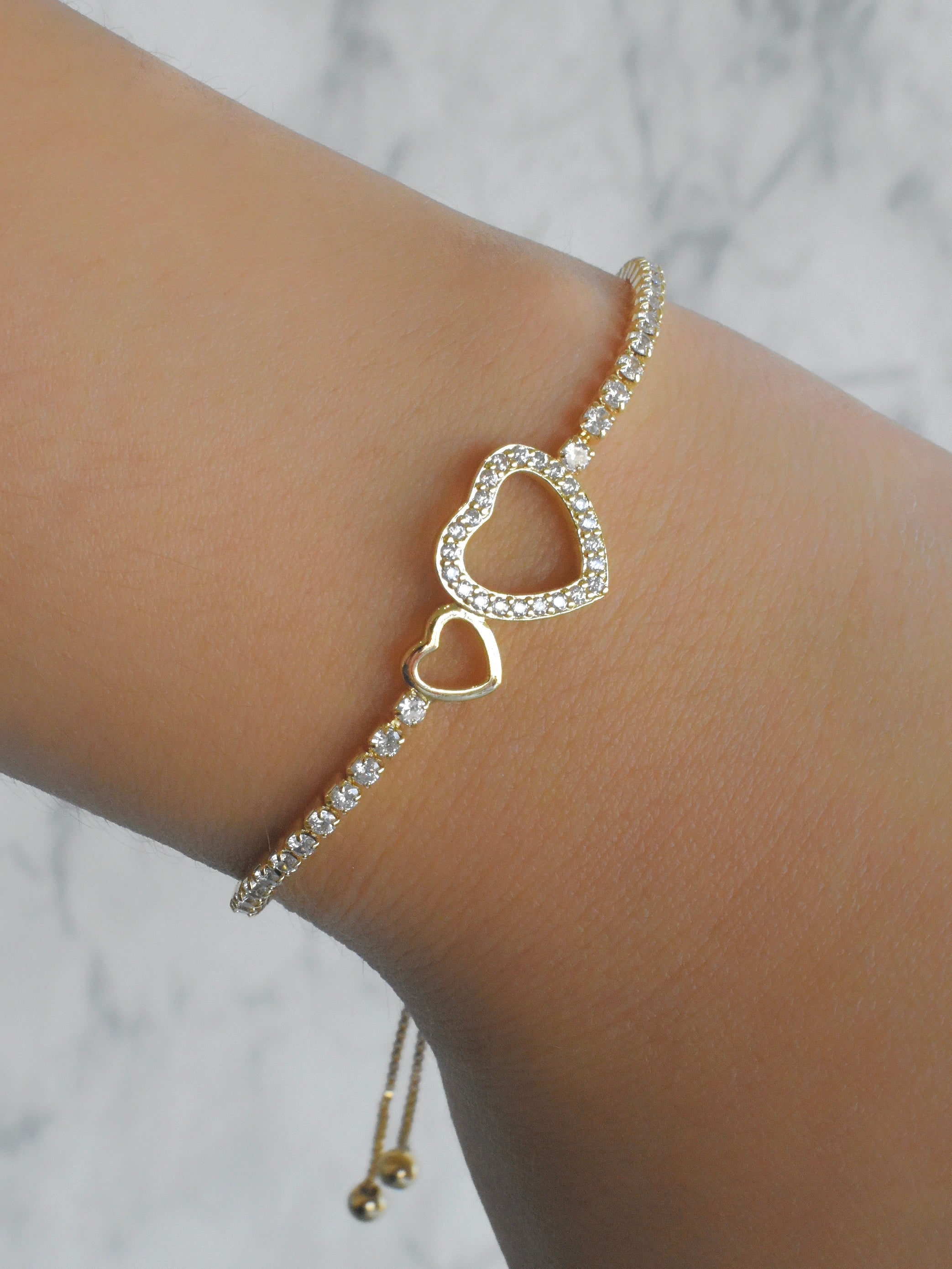 Pulsera doble corazón