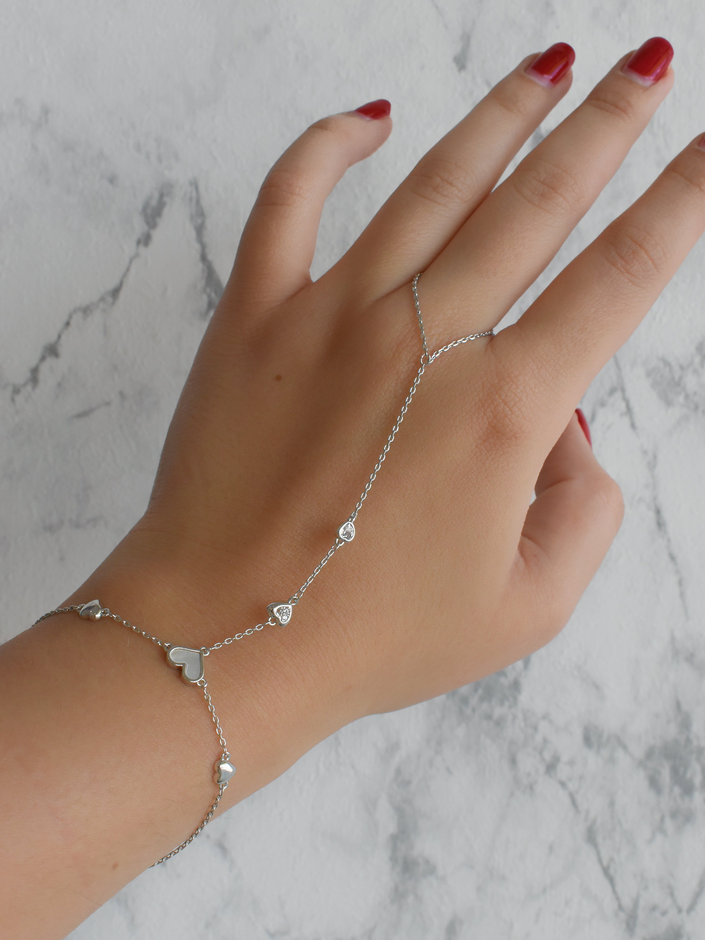Anillo cadena de mano estrellitas