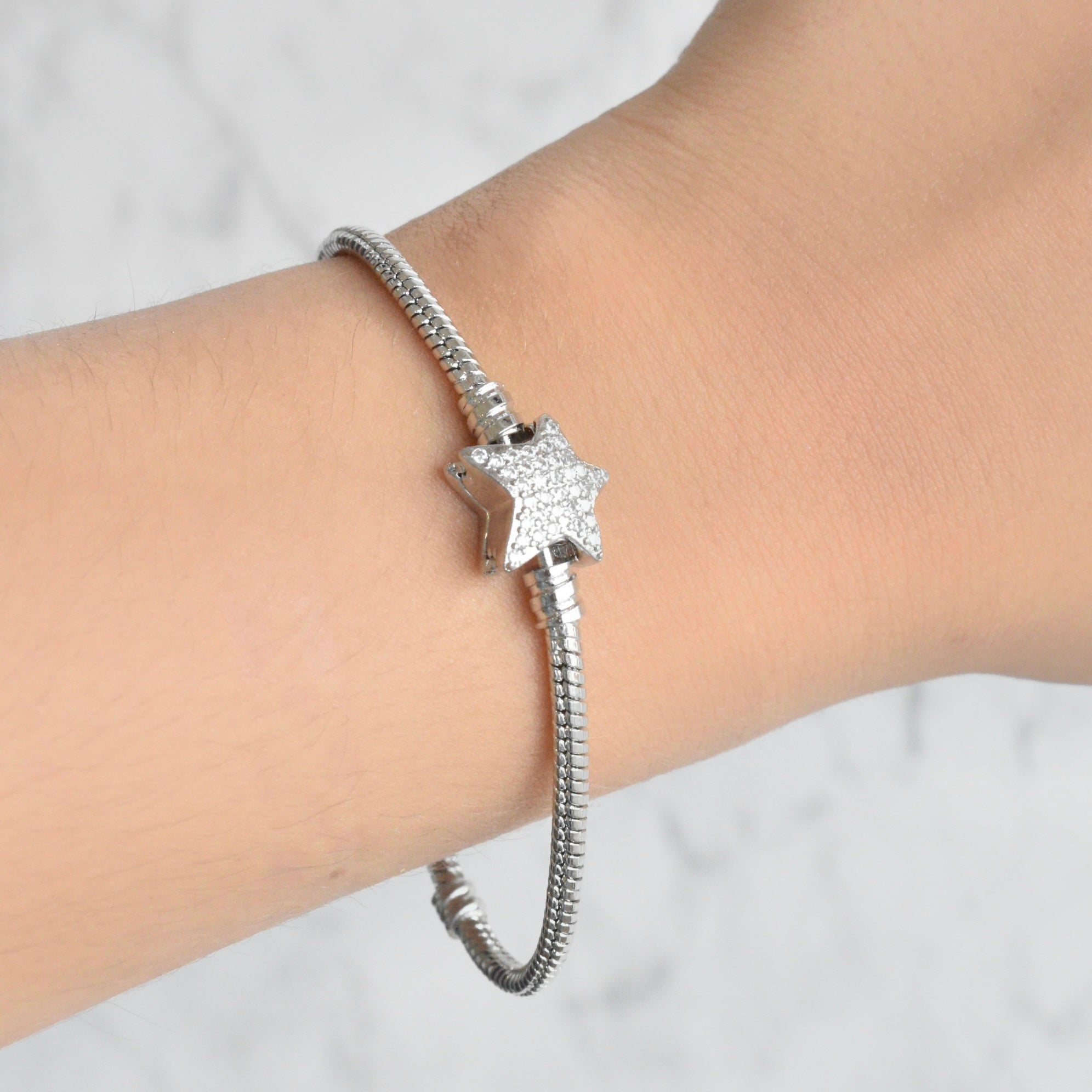 Pulsera estrella circonias (dorada y plateada)