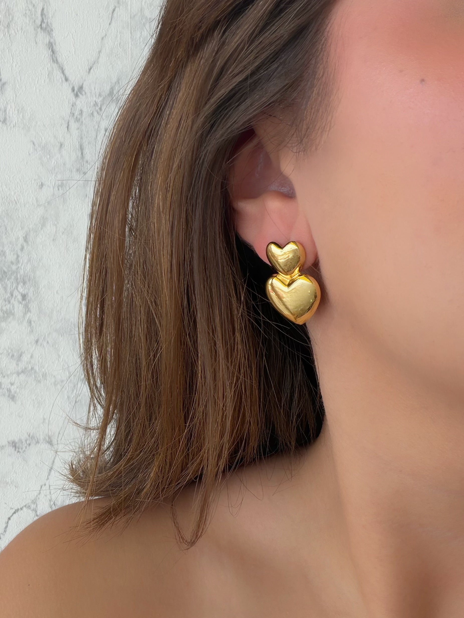 Aretes doble corazón liso