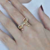 Anillo moño con diseño (dorado y plateado)