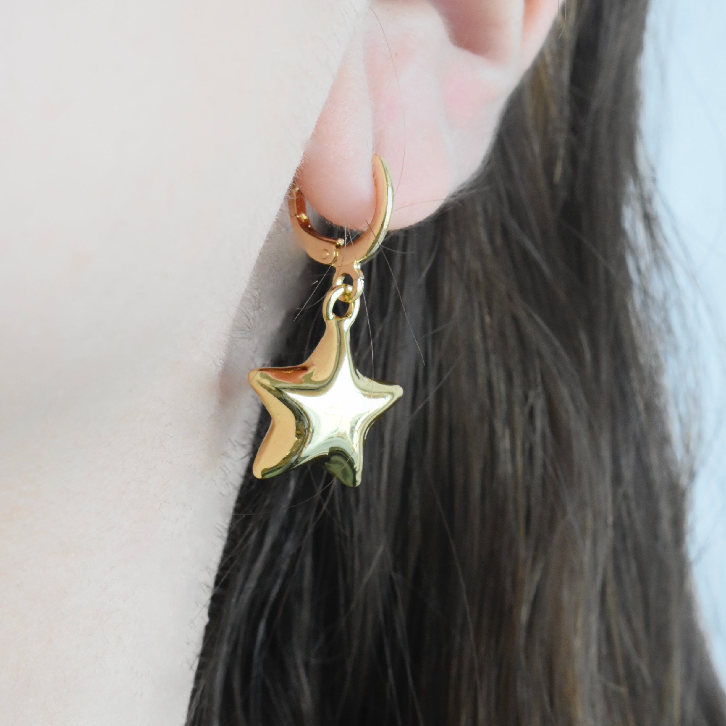 Aretes estrella globo