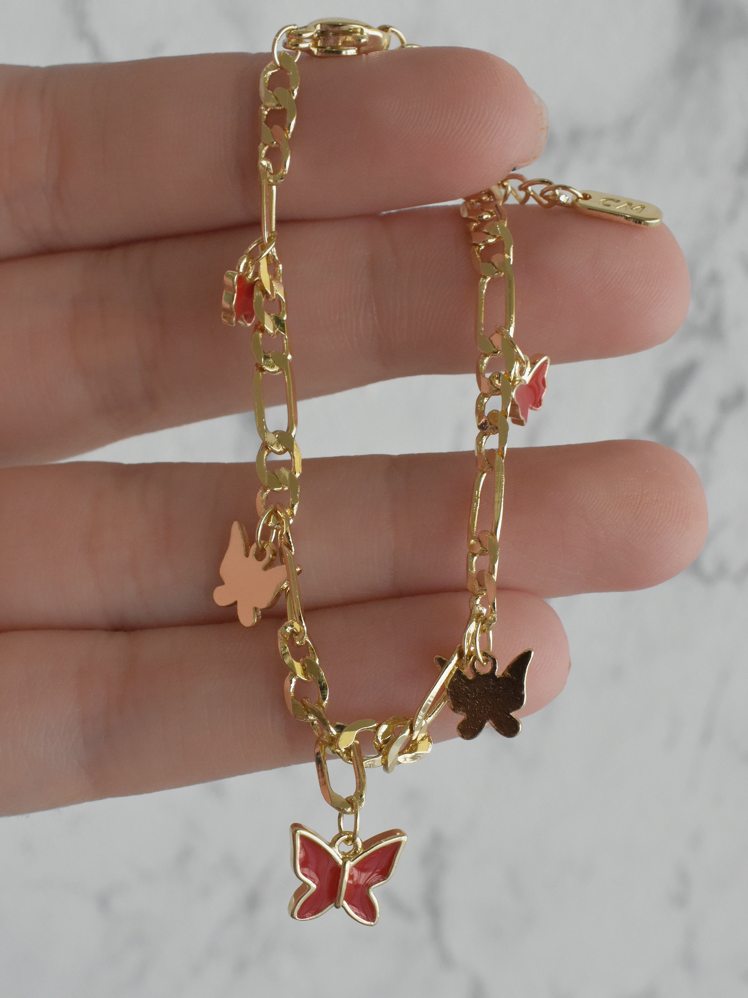 Pulsera mariposas rojas