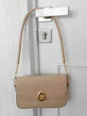 Bolsa de hombro broche herradura (blanca o beige)