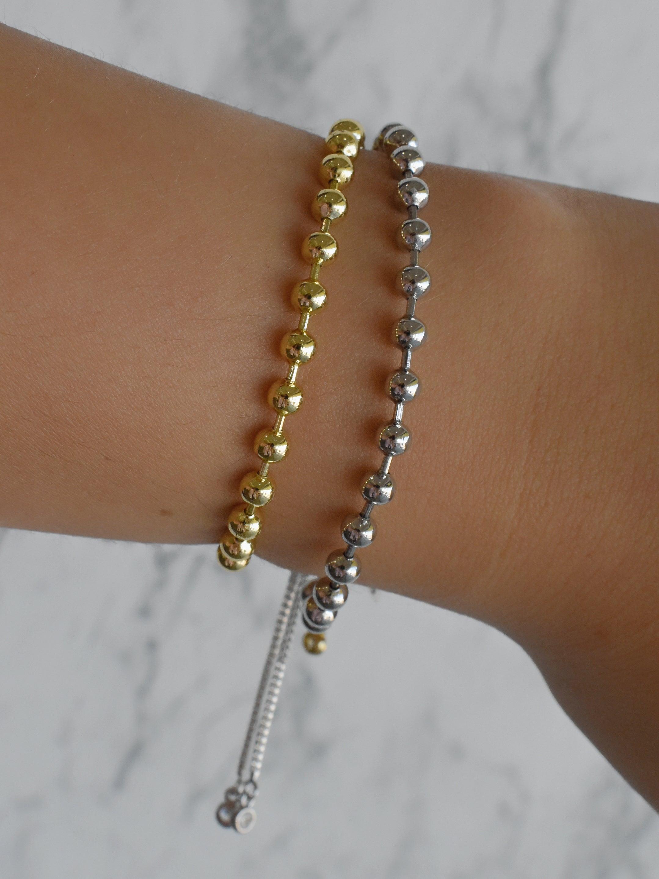 Pulsera bolitas separadas (dorada o plateada)