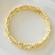 Brazalete triple bolitas