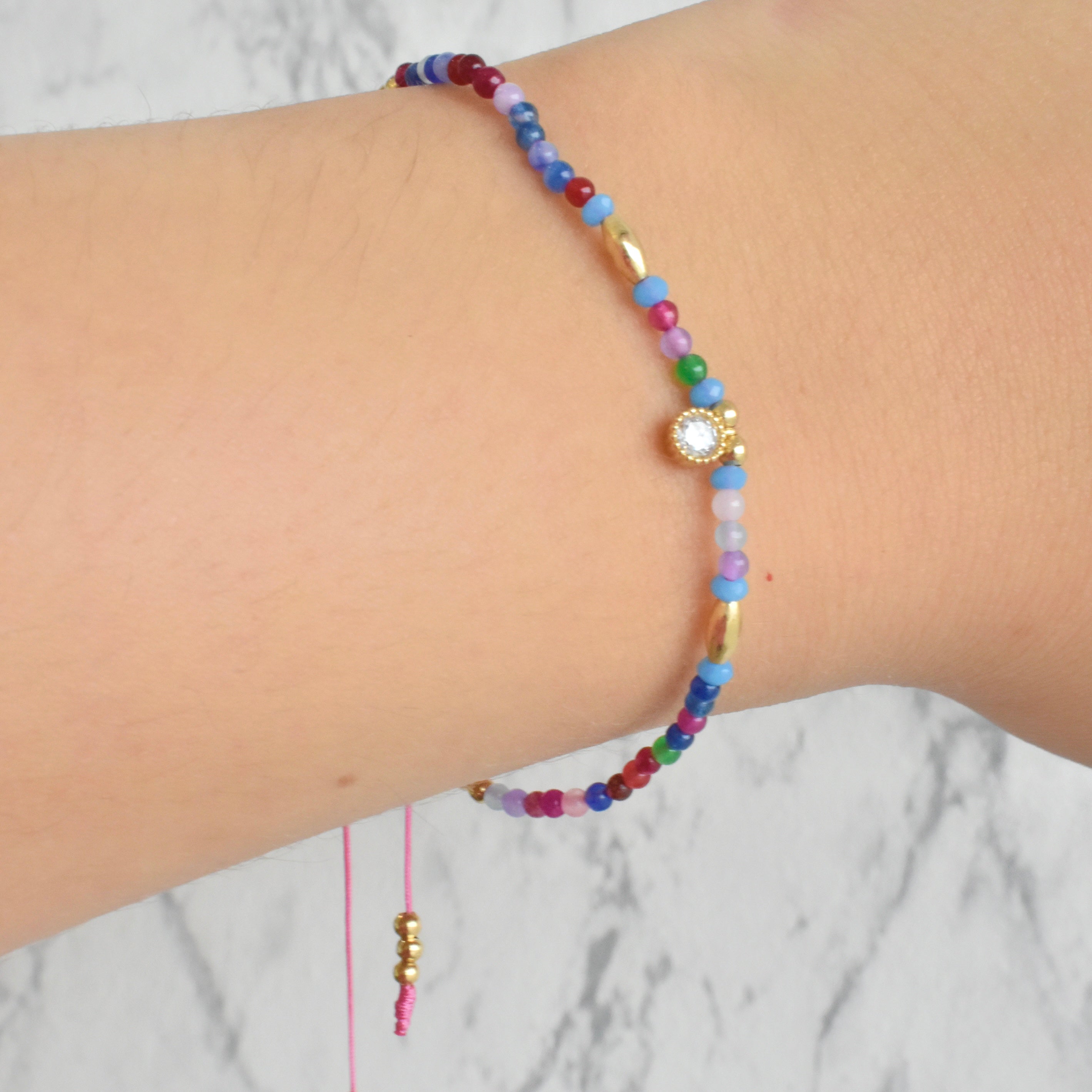 Pulsera mini bolitas circonia (café, colores, morado, rosa)