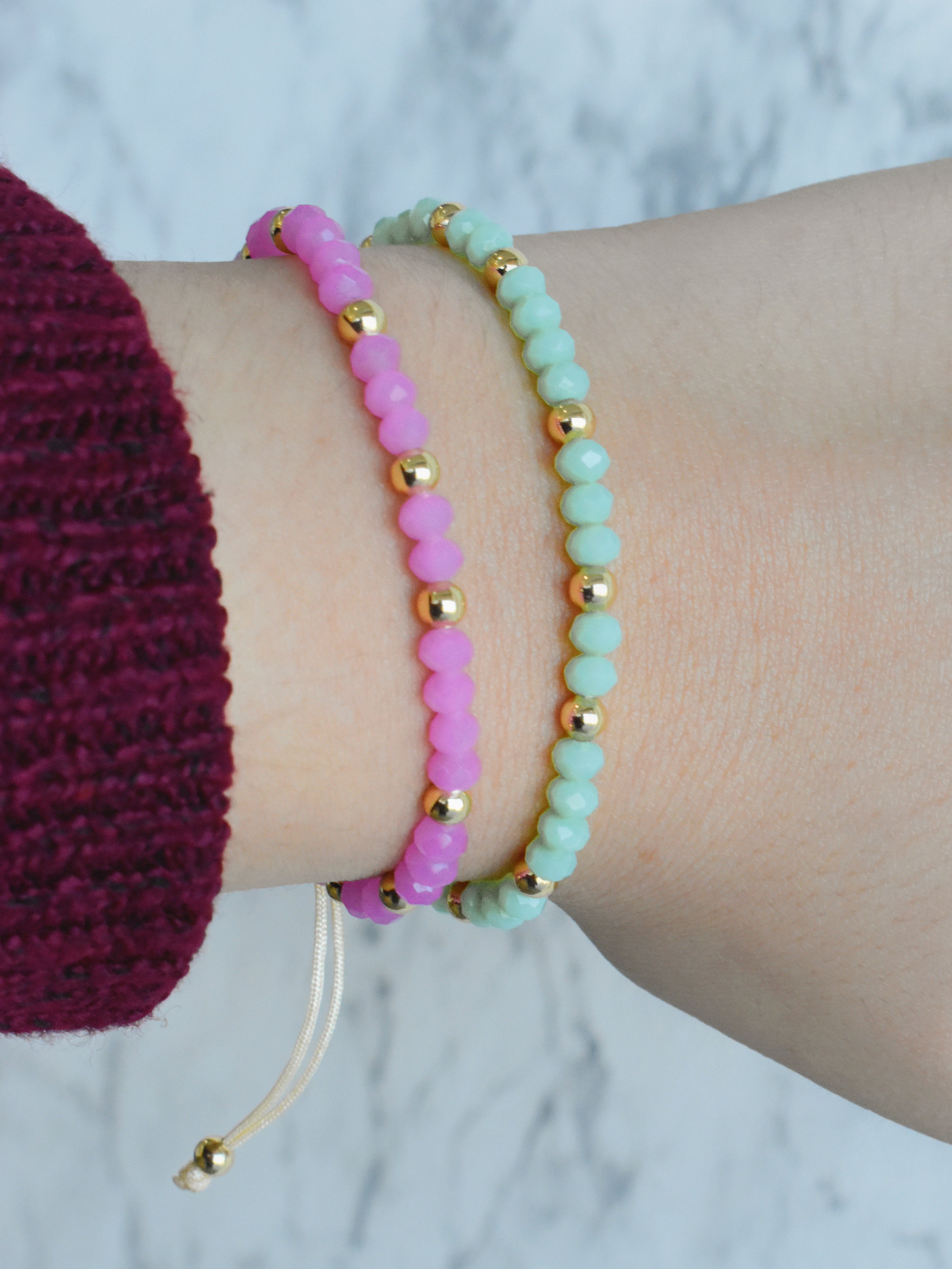 Pulsera hilo bolitas cristal (rosa o verde)