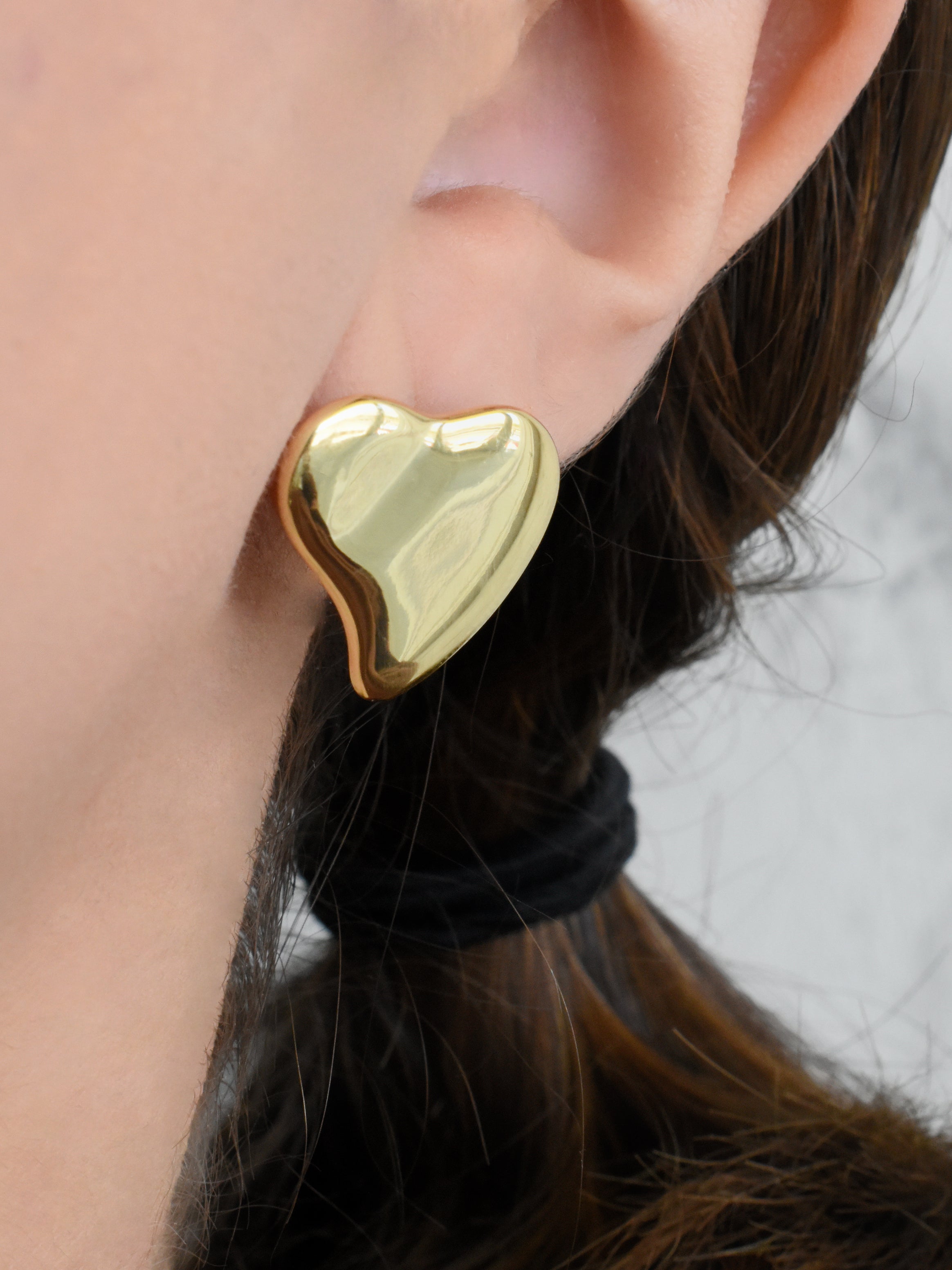 Aretes corazón estilizado