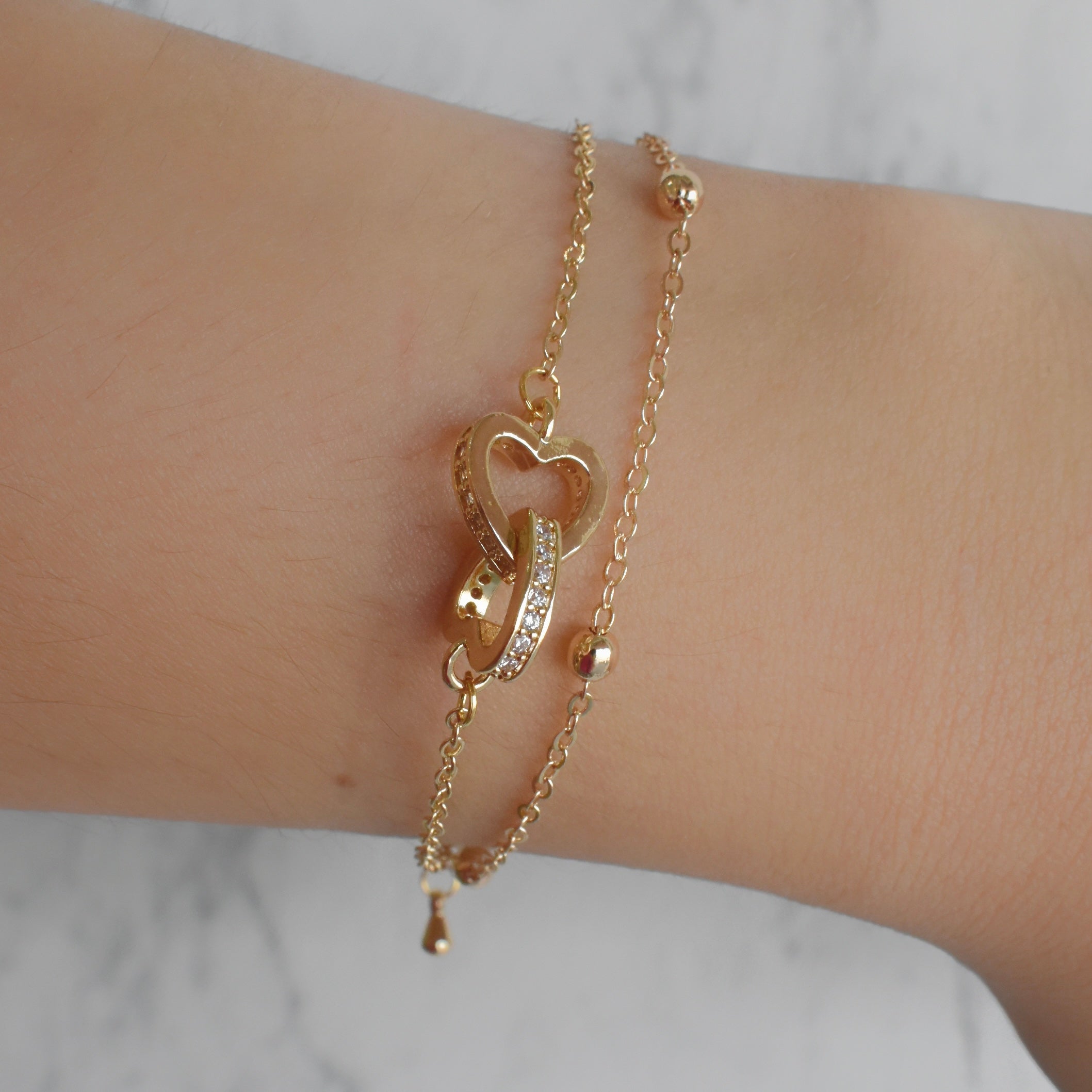 Pulsera doble corazones (dorado o plateado)