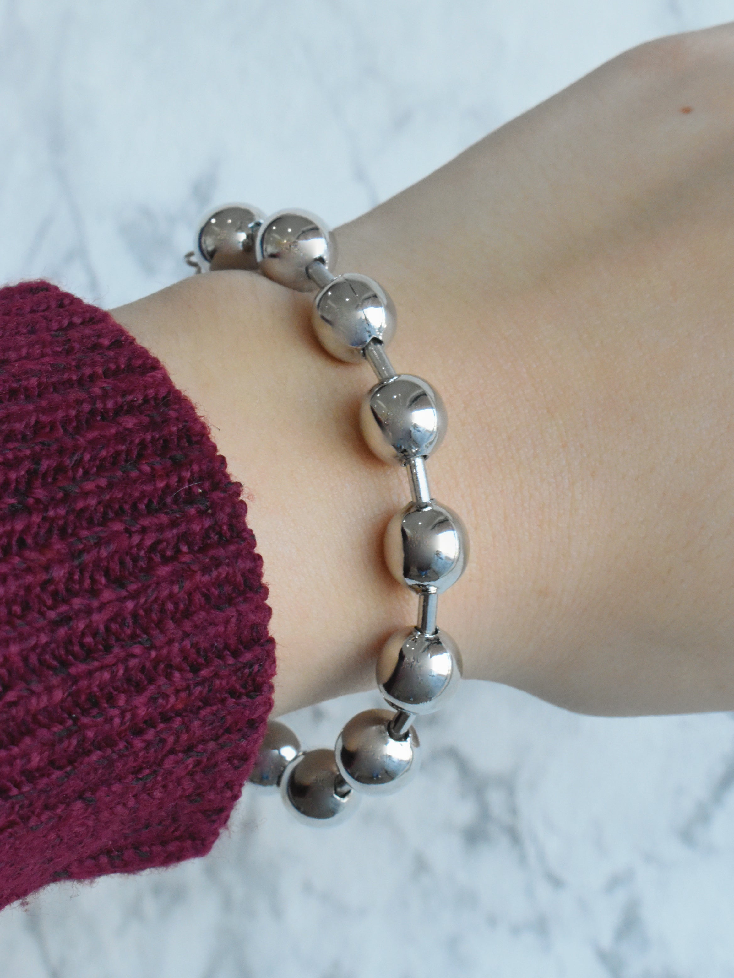 Pulsera bolitas plateadas