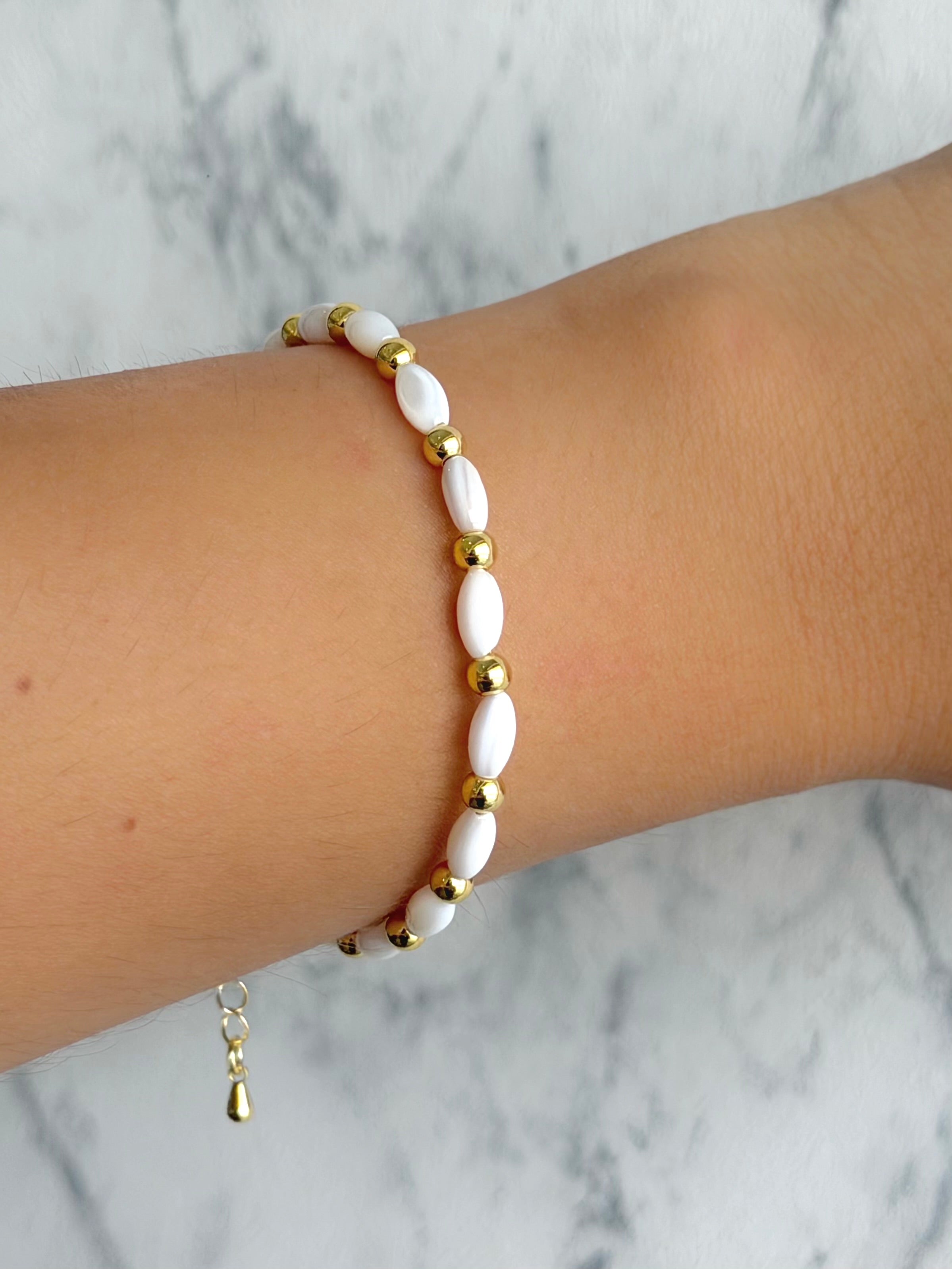 Pulsera óvalos blancos