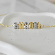 Gargantilla inicial mini globo mixta  (R, N, Y doradas agotadas)